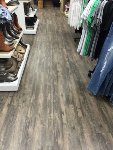 Commercial wood look plank in a clothing retail shop. 